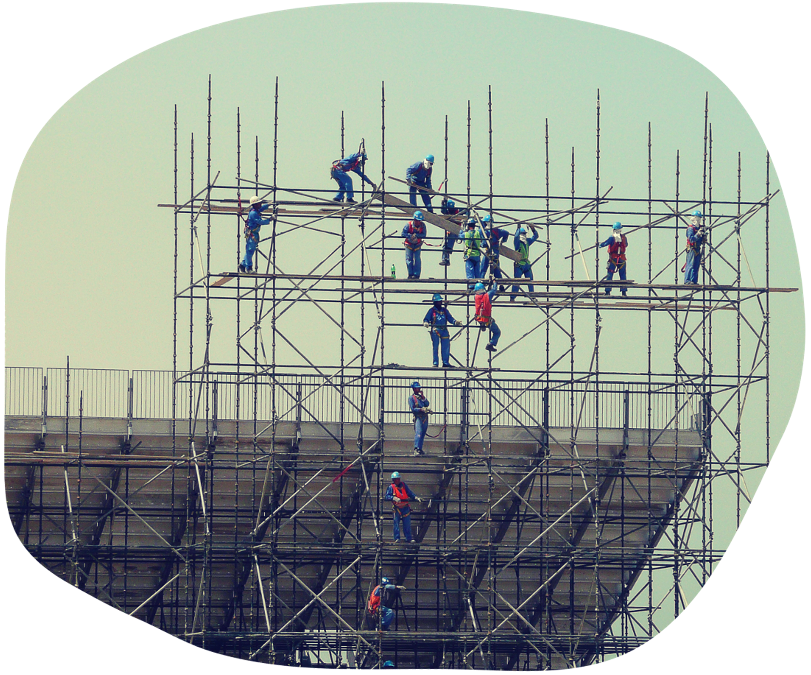 Workers constructing a stadium 