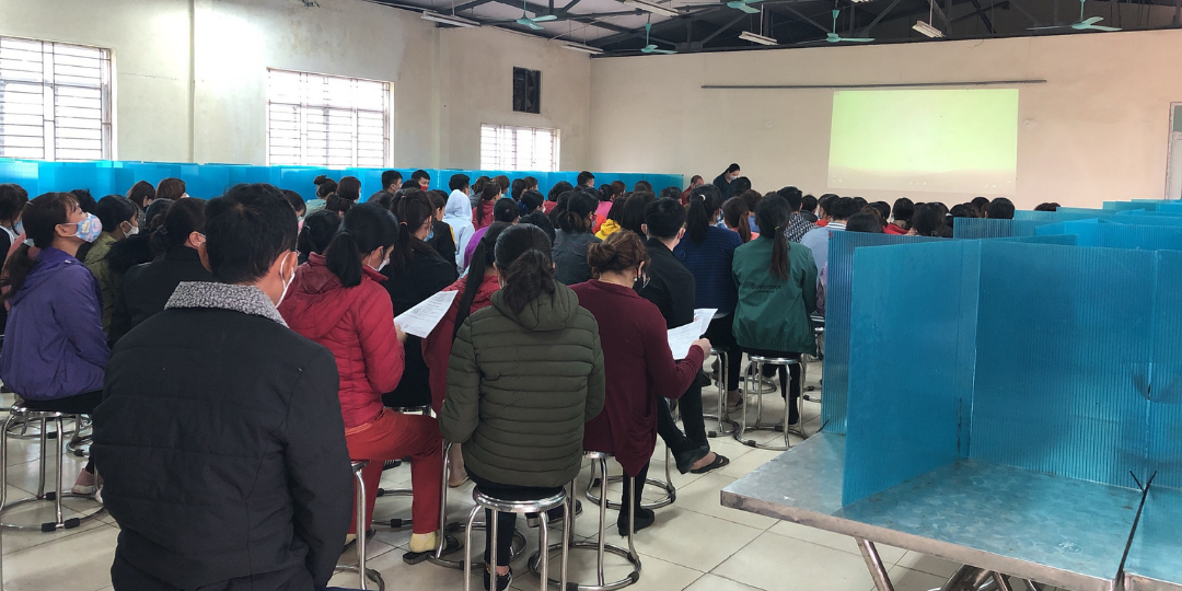 Workers at Speak for Change onboarding in Vietnam